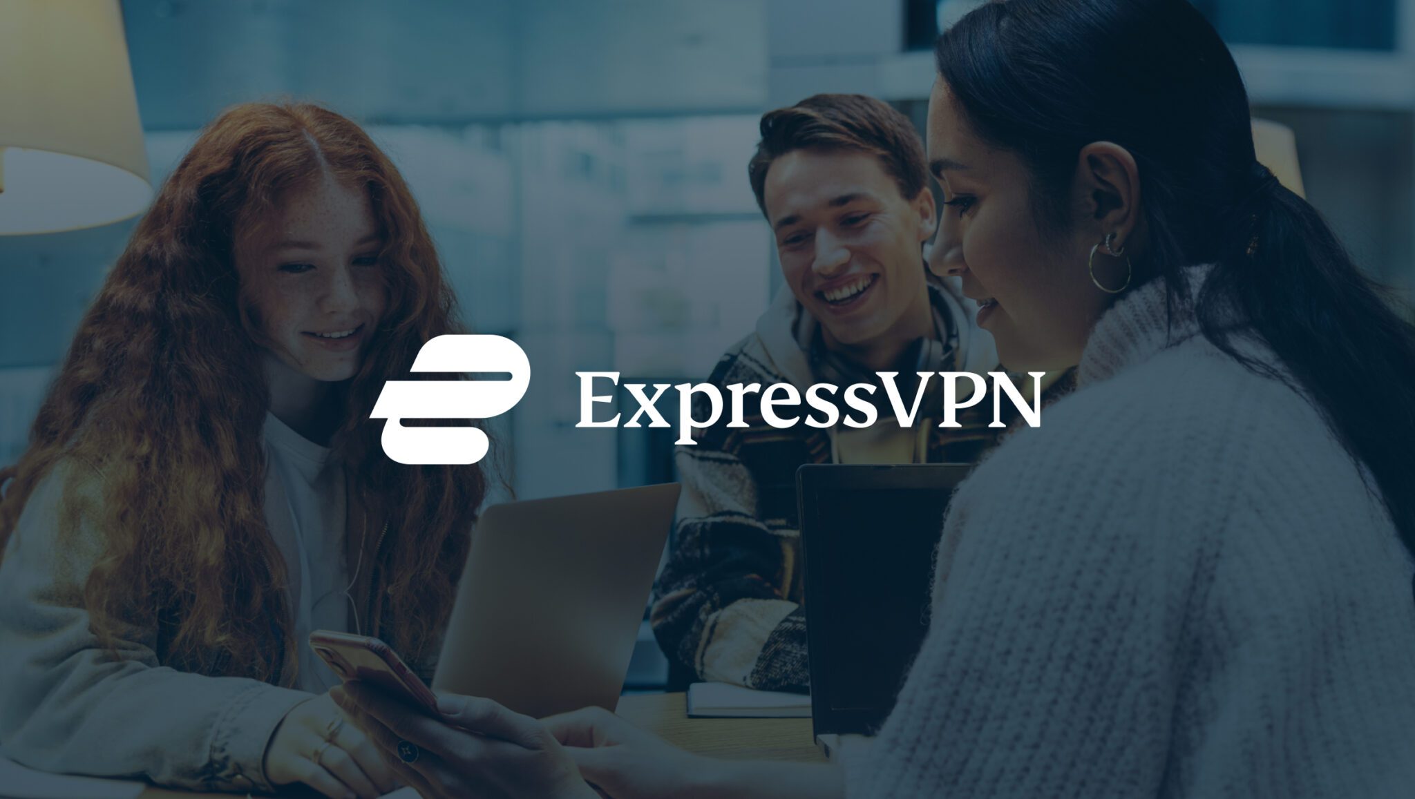 Background image of students studying with ExpressVPN logo overlaid in white