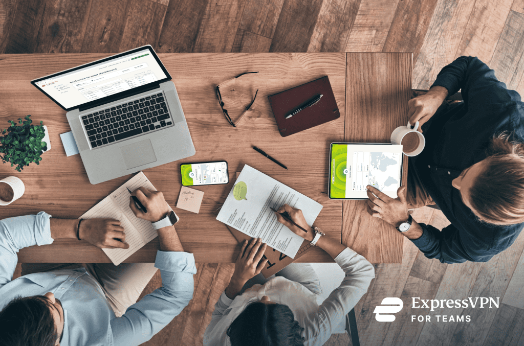 Group of flexible workers being productive in co-working style space featuring ExpressVPN for Teams logo
